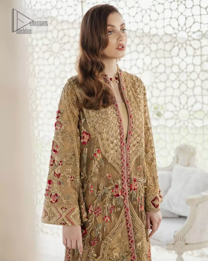 This elegant ensemble turns timeless piece into a chic fantasy. Perfect for this festive season with divine detailing of thread embroidery, color balance and well-crafted zardosi work. Furthermore it is elevated by vibrant floral motifs and red embellished slits. It comprises with self printed sharara ornamented with captivating embellished bottom. Style it up with matching organza dupatta with chann all over.