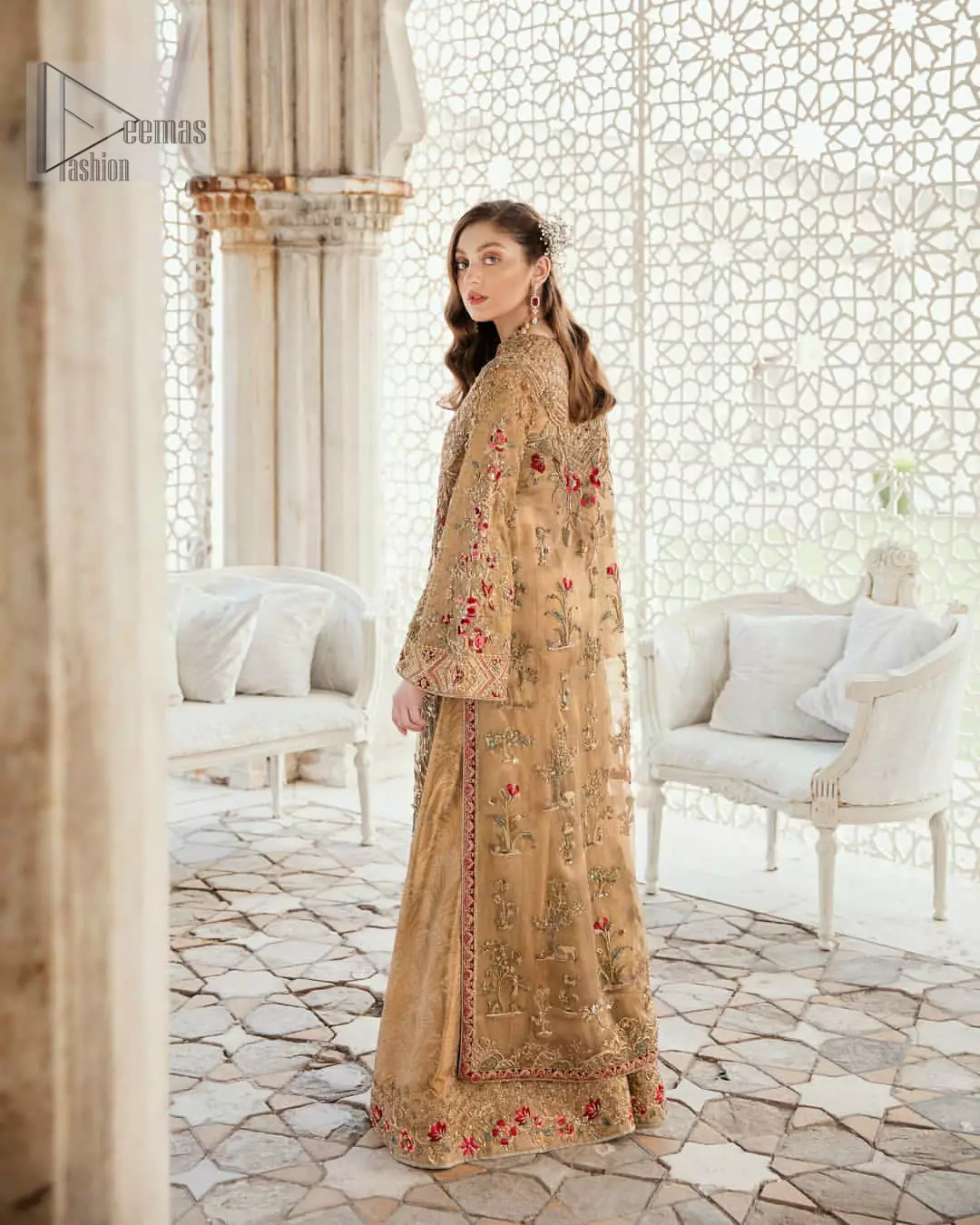 This elegant ensemble turns timeless piece into a chic fantasy. Perfect for this festive season with divine detailing of thread embroidery, color balance and well-crafted zardosi work. Furthermore it is elevated by vibrant floral motifs and red embellished slits. It comprises with self printed sharara ornamented with captivating embellished bottom. Style it up with matching organza dupatta with chann all over.