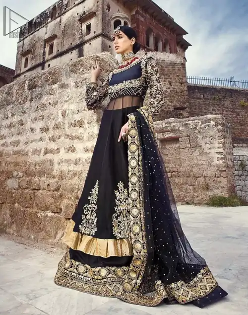 Delicately crafted and personifying chic elegance with an element of grandiose. This regal black outfit is an immensely captivating traditional