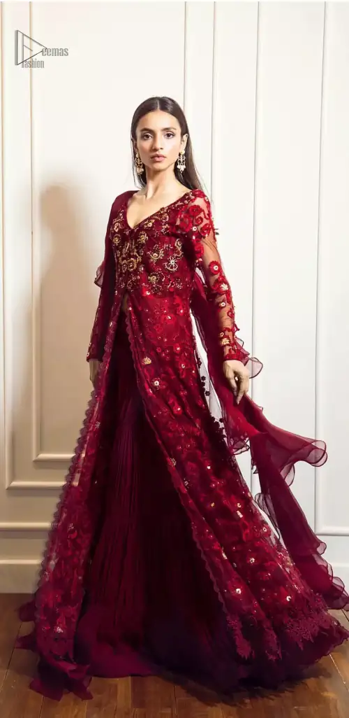 This exceptionally detailed front open gown lehenga is cut in a seductive fit and flare silhouette that’s sure to turn