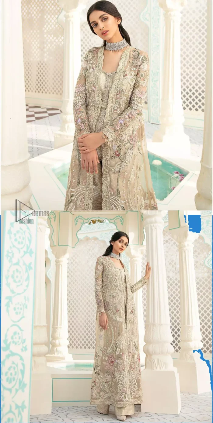 An example of beauty and elegance. A perfect ensemble for this festive season with divine detailing of thread embroidery, color balance and well-crafted scalloped bottom. The front open gown is sculptured with light golden zardozi work all over and multiple color thread embroidered floral. Complete the look with inner jumpsuit style it up with a fixed waist belt. Paired it up with organza dupatta adorned with scattered floral motifs.