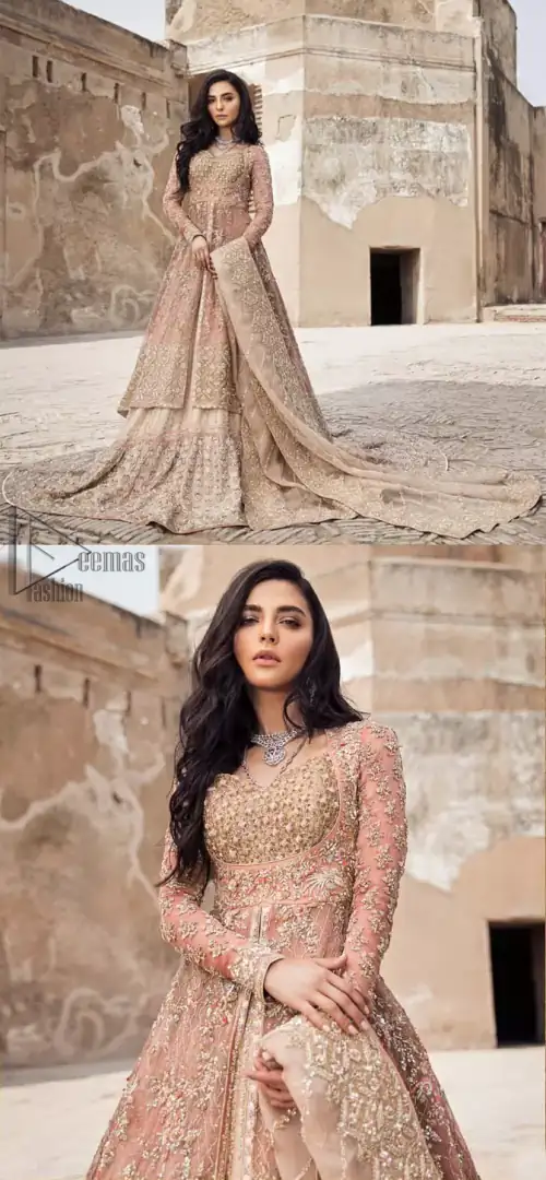 This garnet ensemble is sure to make you look like glamorous royalty with immaculate work covering every inch of the