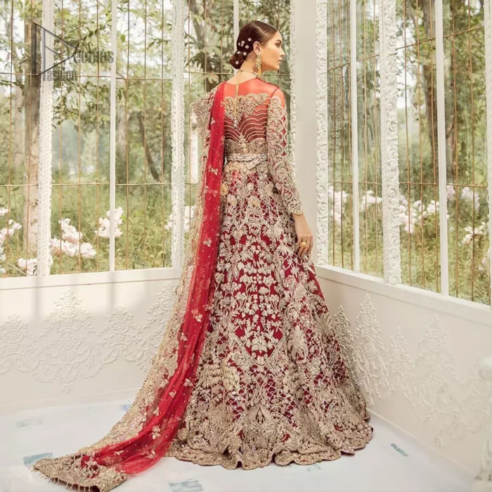This bridal dress is perfect for your big day. Our bride makes a statement in this stunningly floraison, perfect blend of glamour and tradition with outstanding craftsmanship and gorgeous detailing. This floor length maxi is beautifully sculptured floral jhaal, floral bunches and thick scalloped hemline done with light golden kora, dabka, tilla and sequins embroidery. Exude elegance with red lehenga finessed with beautiful embellished scalloped bottom with zardosi work. The red net dupatta with chann and finishing all around the edges makes the look complete.