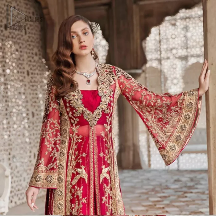 Beautifully elegant with a modern twist. This dress is crafted from delicate floral lace and features a scalloped plunge neckline. The front of the gown is adorned with floral embroidery, bunches and thick embellished side slits done with golden and antique zardozi work. Back of the gown is emphasized with black applique detailing and geometric patterns. The gown is finishing with tassels on the hemline on both sides frond and back. The palazzo pants is adorned with thick embellished applique bottom with golden kora, dabka, tilla and sequins embroidery. It comprises with red chiffon dupatta with sequins spray all over.