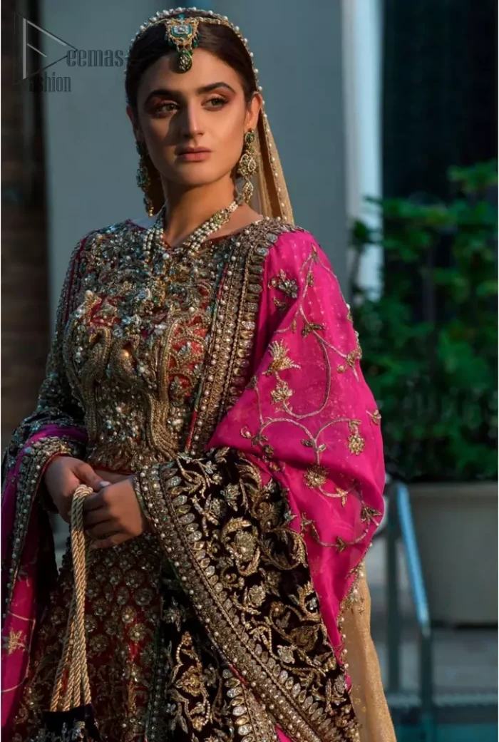 Complete your big day with the perfect dress in our selection of stunning wedding dresses. This regal lehenga blouse is an immensely captivating traditional piece, enhancing the art of classical heritage showcasing the craftsmanship of kora, dabka, tilla and sequibs detailed with pearls, artistically embellished to give a beautiful rhythm to the outfit. The lehenga is adorned with golden and antique shaded embroidery. Furthermore the bottom of the lehenga is enhanced with black embellished applique. Coordinated with beige dupatta sprinkled with sequins all over.