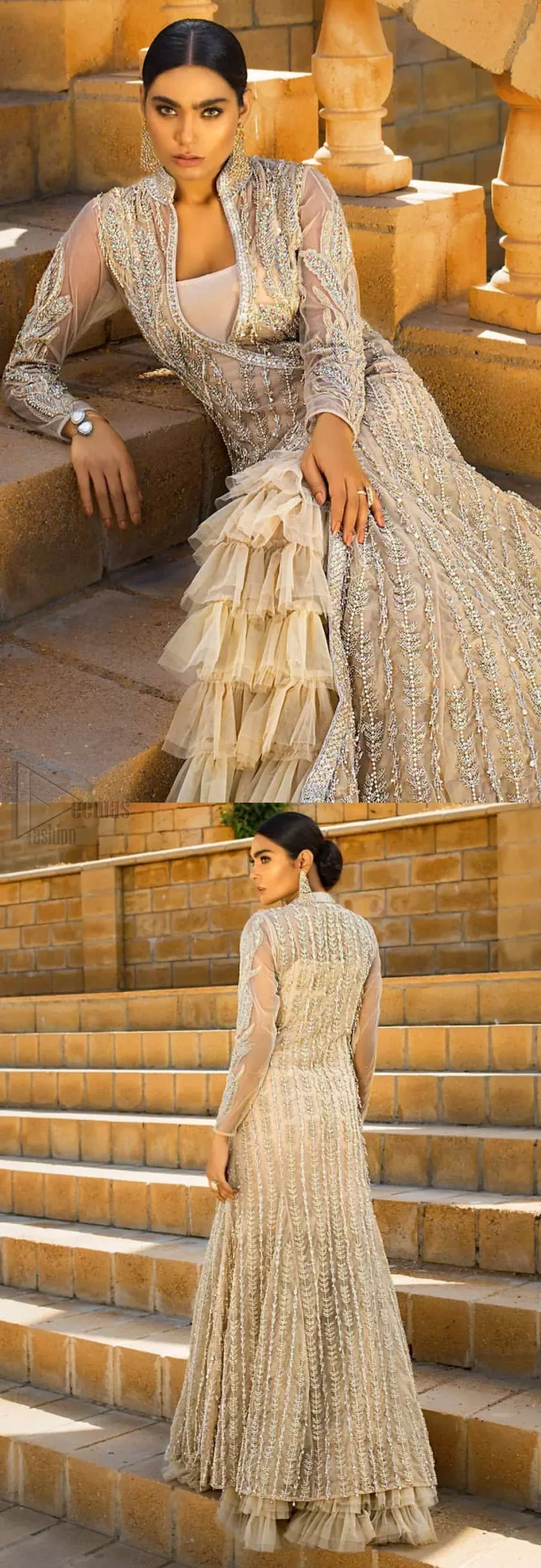 A fusion of traditional and latest fashion making the outfit trendy and unique. This angrakha style floor length maxi is heavily hand crafted with floral embroidery on the bodice, floral booties and vertical lines all over the dress. Back is also enhanced with vertically designed floral booties and swarovski crystals lines all over. The embroidery is done in the shades of silver and dull golden zardozi work. Style it up with frilled lehenga to give it a regal look. This outfit is comprises with fawn net lehenga sprinkled with sequins spray all over.