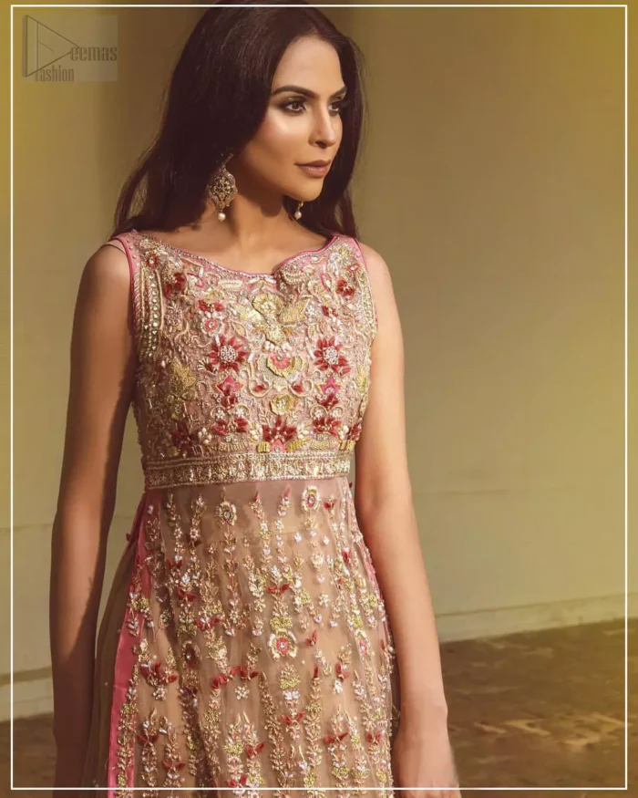 Steal the show with this endearing chiffon outfit with intricate yet rich embroidery. Crafted artfully with detailed multiple color thread embroidery on the bodice and traditional finessed work with kora, dabka, tilla and sequins. Hemline is intricately done with cut work and dangling balls, rest of the shirt is enhanced with floral bunches. Pair it up with fawn lehenga emphasized with different sized circular embroidered motifs at the bottom done with zardozi work to gave it a perfect look. Pair it up with fawn dupatta having four sided embellished borders and sprinkled with sequins all over the ground.