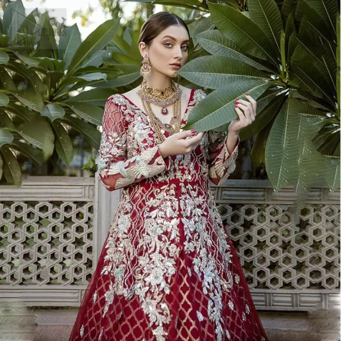 This front open marron maxi is creating a dreamy composition. The chic yet elegant front open maxi is decorated with floral embroidery , heavily embellished bodice and floral bunches. Hemline is even more enhanced with birds motifs finished with jamawar lining adorned with geometric patterns in it. The embroidery is done with silver and white kora, dabka, tilla, and pearls. It comes with straight trousers allured with sprinkled motifs on dupatta dupatta finished with silver lace all around the edges.  