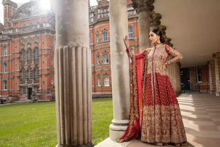 Crafted with love. Make your big day more beautiful with our excessively embroidered front open gown featuring delicately embellished neckline along with geometric patterns highlighted in zardozi detailing and intricately embroidered bottom that gives perfect ending to this outfit. Crafted artfully with golden kora, dabka, tilla, sequins and thread work. The embellished alluring scalloped borders dupatta gives the perfect ending to this peplum. The dupatta is furthermore enhanced with dangling tassels and multiple color thread embroidery.
