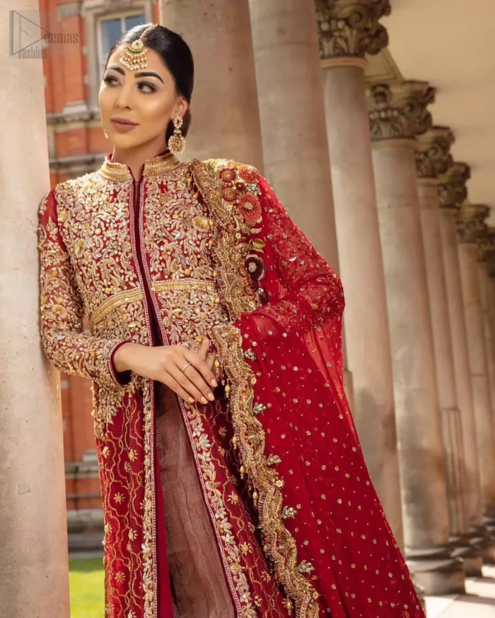 Crafted with love. Make your big day more beautiful with our excessively embroidered front open gown featuring delicately embellished neckline along with geometric patterns highlighted in zardozi detailing and intricately embroidered bottom that gives perfect ending to this outfit. Crafted artfully with golden kora, dabka, tilla, sequins and thread work. The embellished alluring scalloped borders dupatta gives the perfect ending to this peplum. The dupatta is furthermore enhanced with dangling tassels and multiple color thread embroidery.