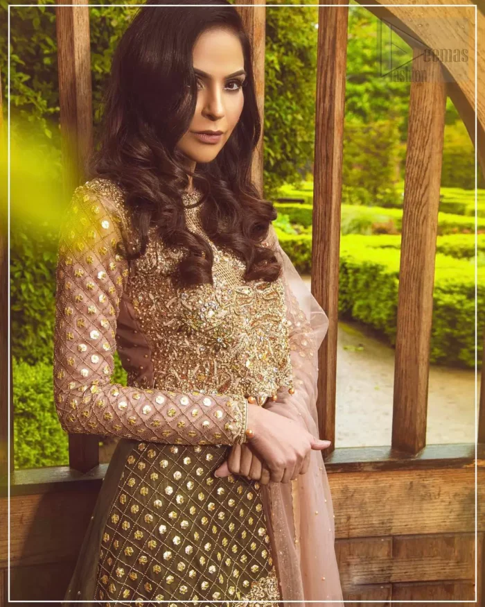Nothing speaks of femininity and class louder than this mehndi outfits for bridesmaids. The motifs on the mehndi lehenga for a wedding are a true example of decorative and ornamental expression stylized in a contemporary way. The chic yet elegant mehndi green lehenga is decorated with zardozi embellished vertical lines, geometric patterns adorned with gotta work and floral bunches. Borders are even more enhanced with detailed motifs and finished with scallops. The blouse is fully decorated with floral embroidery all over with zardozi work in the shades of golden and antique. The look is completed with organza dupatta with embroidered lace borders and sequins spray all over.