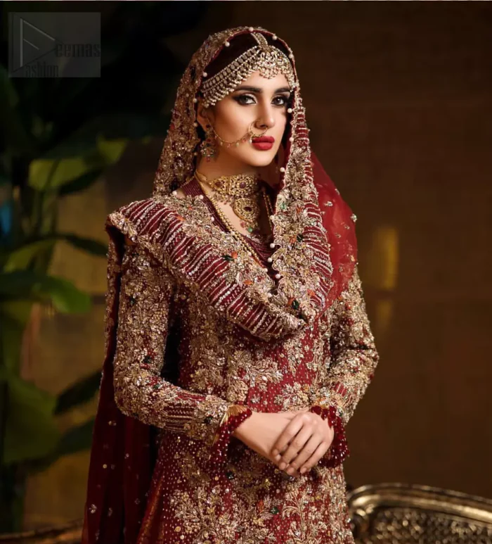 Captured in traditional silhouette. The bridal stands out due to its uniqueness and the perfect fusion of modern cut and traditional embroidery. This dress is beautifully highlighted with zardozi work in the shades of tan and silver. The hemline of the shirt is adorned with scalloped finishing and tassels on the sleeves. It comes with katan banarsi gharara with wide flare decorated with kora, dabka, tilla and pearls work. It is coordinated with organza dupatta which is sprinkled with sequins all over it. It is further furnished with four sided scalloped border.