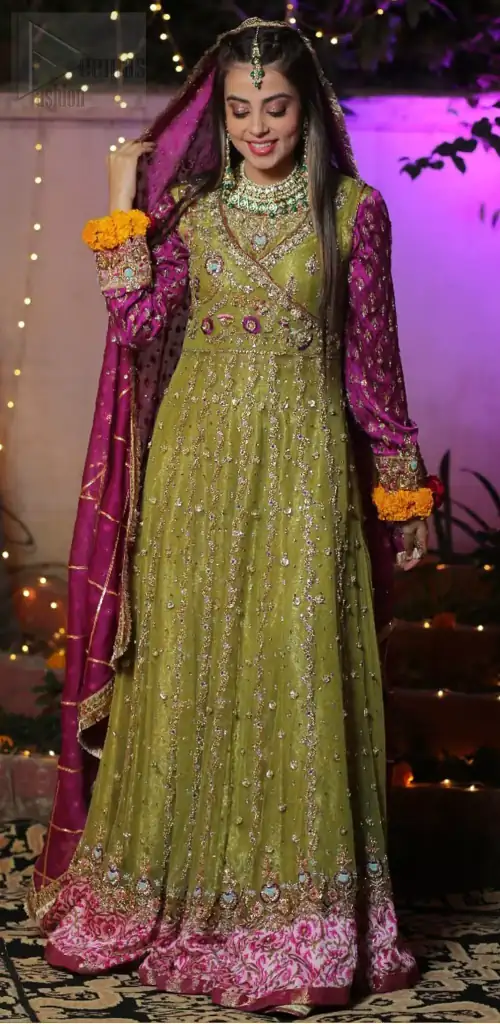 Nothing speaks of femininity and class louder than this mehndi outfits for bridesmaids. The sequinned whimsical florals embroidered across the