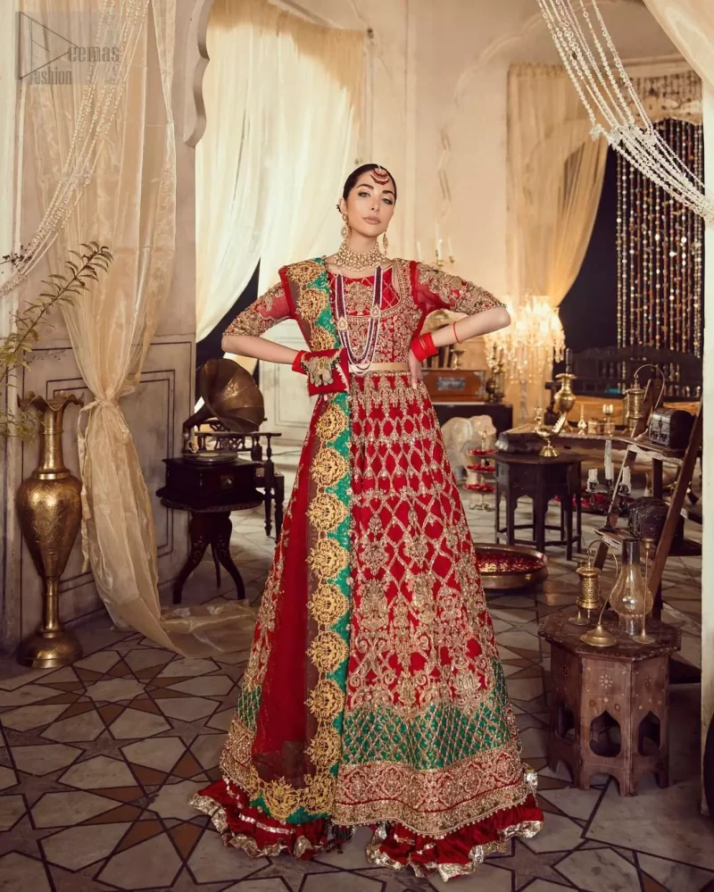 Classic, timeless and truly beautiful, our bridal dress is perfect for your unforgettable day. Our bride makes a statement in this stunningly floraison, perfect blend of glamour and tradition with outstanding craftsmanship and gorgeous detailing. The floor length maxi is delicately crafted with golden kora, dabka, tilla, sequins and pearls work. Furthermore it is adorned sea green applique with rich patterns and delicate details at the daaman. Crushed chiffon sharara are included to complete the look. This beautiful dupatta with rich embroidered motifs places artistically on the borders gives it a royal look.