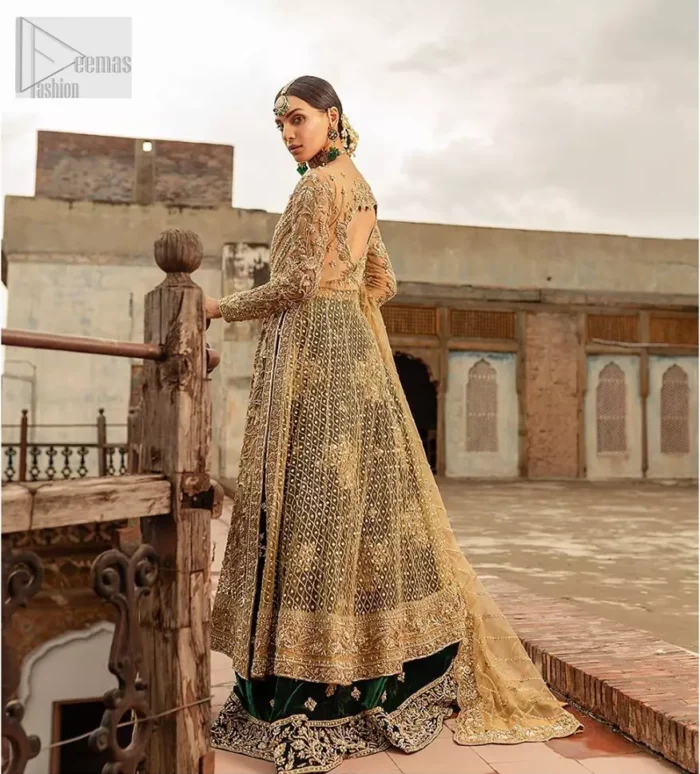 The new season is all about making a statement. Make your moment memorable being a queen in our fawn front open pishwas intensified with voguish sleeves, floral pattern all over and finished with thick embroidered border. The back of the shirt is also enhanced with criss cross patterns filling with beads. Pair it up with bottle green velvet lehenga emphasized with scattered floral motifs and intricate zardozi detailing at the bottom. Dupatta is decorated with vintage froral and finished with embroidered scalloped border on four sides which makes this outfit more beautiful.