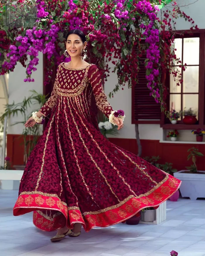 The perfect combination of tradition and class. With a lot of attention to detail, the intricate zardozi work with using glass beading and threads makes the bodice look like nothing but a dream. The tiny floral motifs are also scattered on the bodice. This mehndi outfit is ornamented with vertical embroidered lines and coral applique at the bottom. It comprises with maroon capri pants and coral self fabric dupattta. You are all set to make a lasting impact with the divine royalty of this dress.