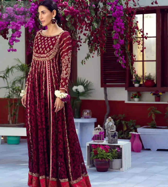 The perfect combination of tradition and class. With a lot of attention to detail, the intricate zardozi work with using glass beading and threads makes the bodice look like nothing but a dream. The tiny floral motifs are also scattered on the bodice. This mehndi outfit is ornamented with vertical embroidered lines and coral applique at the bottom. It comprises with maroon capri pants and coral self fabric dupattta. You are all set to make a lasting impact with the divine royalty of this dress.