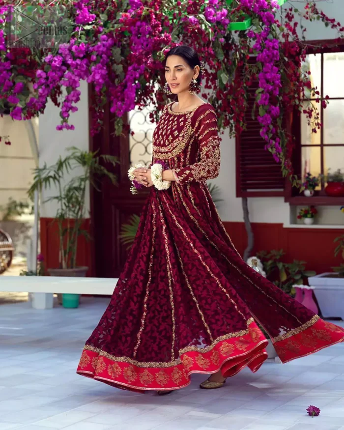 The perfect combination of tradition and class. With a lot of attention to detail, the intricate zardozi work with using glass beading and threads makes the bodice look like nothing but a dream. The tiny floral motifs are also scattered on the bodice. This mehndi outfit is ornamented with vertical embroidered lines and coral applique at the bottom. It comprises with maroon capri pants and coral self fabric dupattta. You are all set to make a lasting impact with the divine royalty of this dress.