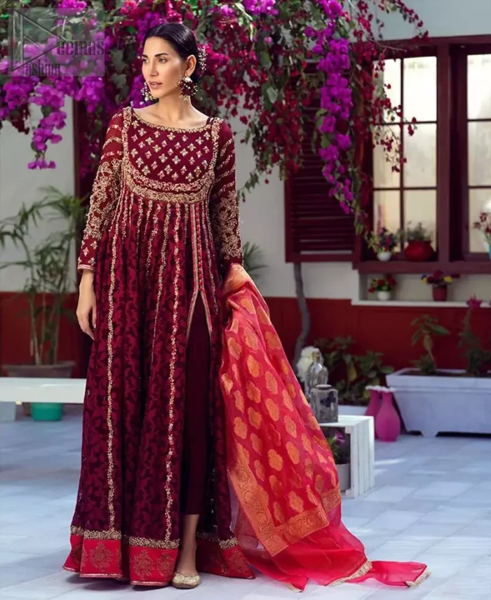 The perfect combination of tradition and class. With a lot of attention to detail, the intricate zardozi work with using glass beading and threads makes the bodice look like nothing but a dream. The tiny floral motifs are also scattered on the bodice. This mehndi outfit is ornamented with vertical embroidered lines and coral applique at the bottom. It comprises with maroon capri pants and coral self fabric dupattta. You are all set to make a lasting impact with the divine royalty of this dress.