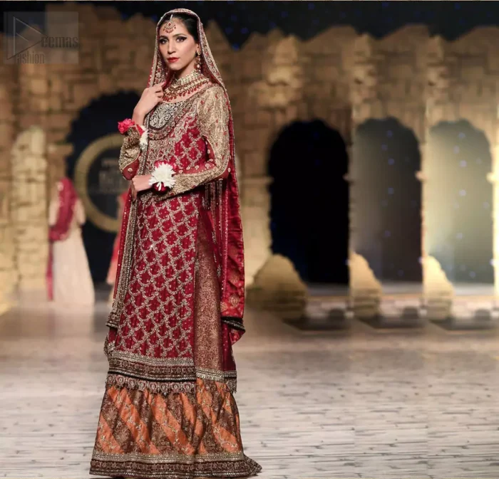 Classic, timeless and truly beautiful, our bridal dress is perfect for your unforgettable day. A perfectly pretty combination of antique and light gold embellishment, this wedding dress is elegant and eye-catching in equal measure. The bodice is crafted artfully with embellished bodice and rest of the shirt is adorned with geometric patterns.  Finished with fine zardozi work on the hemline and decorative. Accompanied by a banarsi chatta patti lehenga enhanced with antique shaded kora, dabka and tilla embroidery. Finish the look with maroon organza dupatta having embroidery on all four sides.