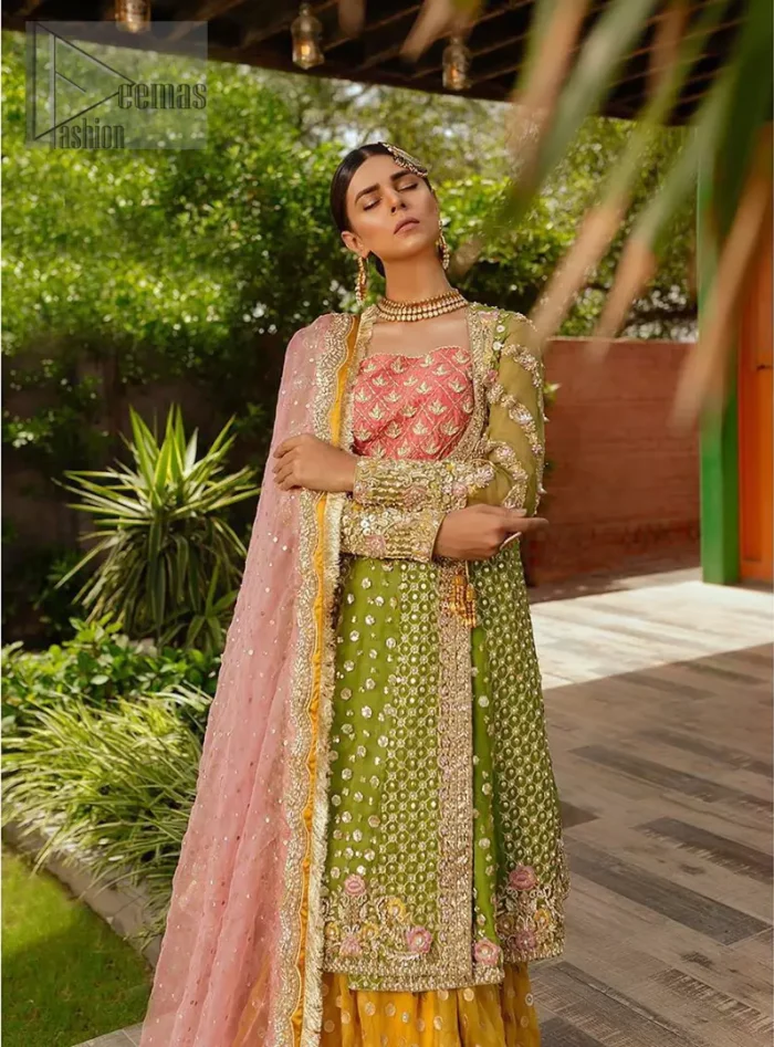 We have brought a charismatic charm to the traditional motifs and cuts. Our embroidery is rich in detailed traditional techniques executed to perfection. The bride shines bright in this outfit, embedded with sophisticated zardozi and thread embeishments. The bodice and hemline is furthermore emphasized with intricate details that gives the perfect ending to this mehndi dress. Pair it up with yellow sharara with captivating embellished border. The dupatta incorporates beautifully designed borders with zardozi, applique and kiran along the length, focusing on the geometrically embellished pallu and sequins spray all over to give it a perfect look.
