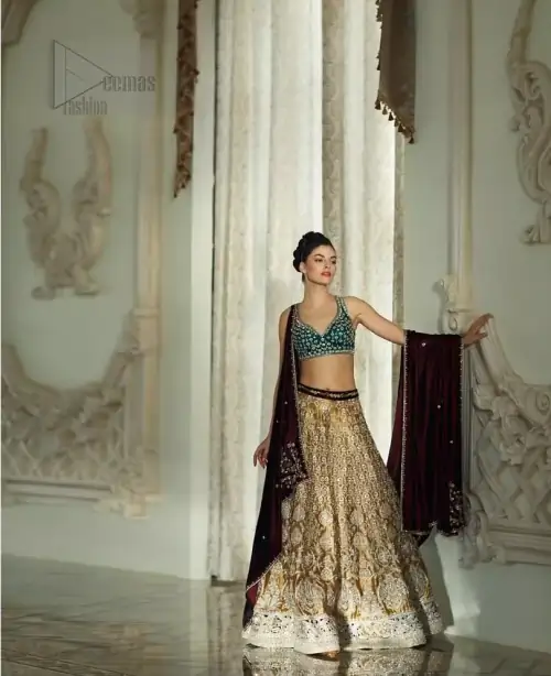 Delicately crafted and personifying chic elegance with an element of grandiose. Gussy up in this luxuriously designed lehenga blouse emboldened