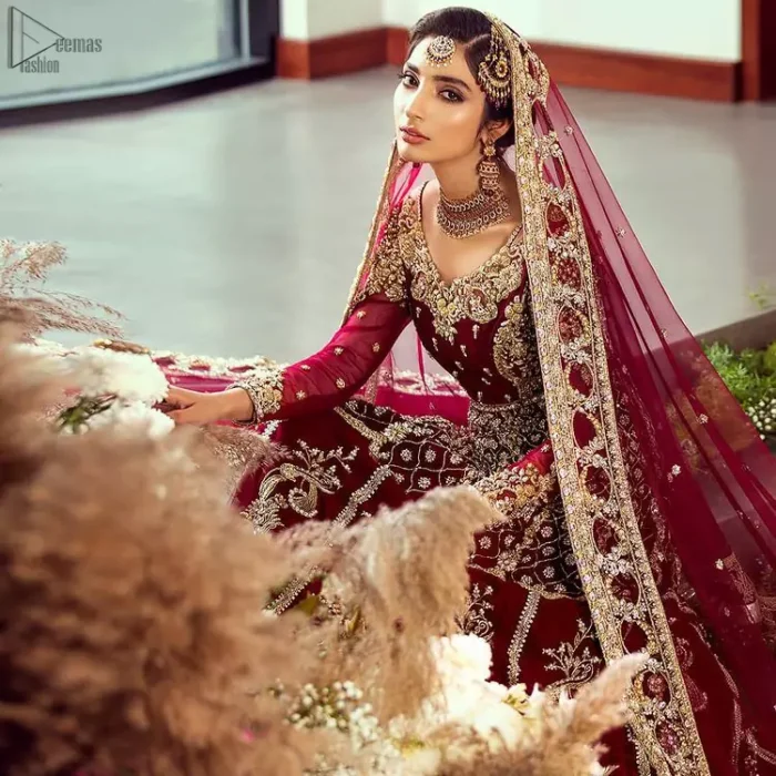 Did you recently say “YES” to the person of your dreams? Now it’s time to start searching for the perfect dress. Then hold your breath, as we reveal this masterpiece. A sensational affair so timeless and magnificent, beautifully crafted with light golden zardozi work. Craftmanship and skills you've never witnessed before. The pishwas is fully decorated with geometric patterns, floral bootis and tea rose embroidered appliqued bottom. It is paired with an ethereal bridal dupatta focusing on kora and dabka handwork borders on all four sides, finishing with scattered tiny floral motifs on the ground.