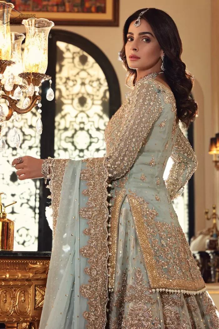 This colour is the perfect feminine and delicate shade with its meticulously crafted fabrication with the flow of organza dusted with pearls to the richness of the shirt and dupatta pallu bordered with gorgeous embroideries. Adorned with sterling sequences and silver and crystal hand embellishments, its a classic modern masterpiece. Lehenga is emphasized with two layers of fabrics, the inner layer is of banarsi and the upper layer is fully embellished with zardozi work. Embroidery is done in the shades of antique and silver. The outfit is complemented with a mint green dupatta with chann all over and finishing with handwork borders all around the edges.