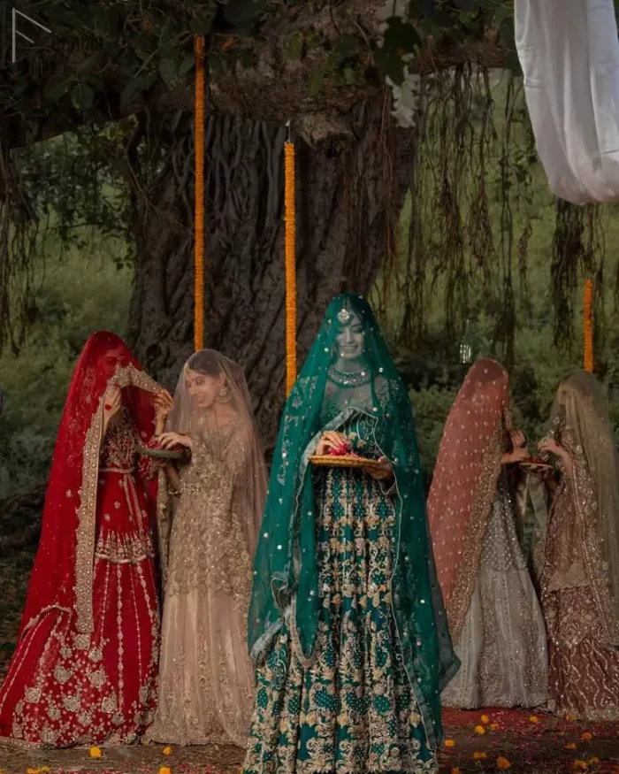 The new season is all about making a statement. Unique craftsmanship and detailed embellishments bring heavenly hued gossamer fabrics to life. Add a charm to your mehndi with an intricately golden embellished bodice and motifs all around the flare on sea green canvas of organza. Daaman is elegantly decorated with embroidered golden floral bootis, sprinkled sequins and beautiful craftsmanship. Pair it up with sea-green sharara having delicate details at the bottom instantly draws attention. To complete the look, go with ivory brocade dupatta.