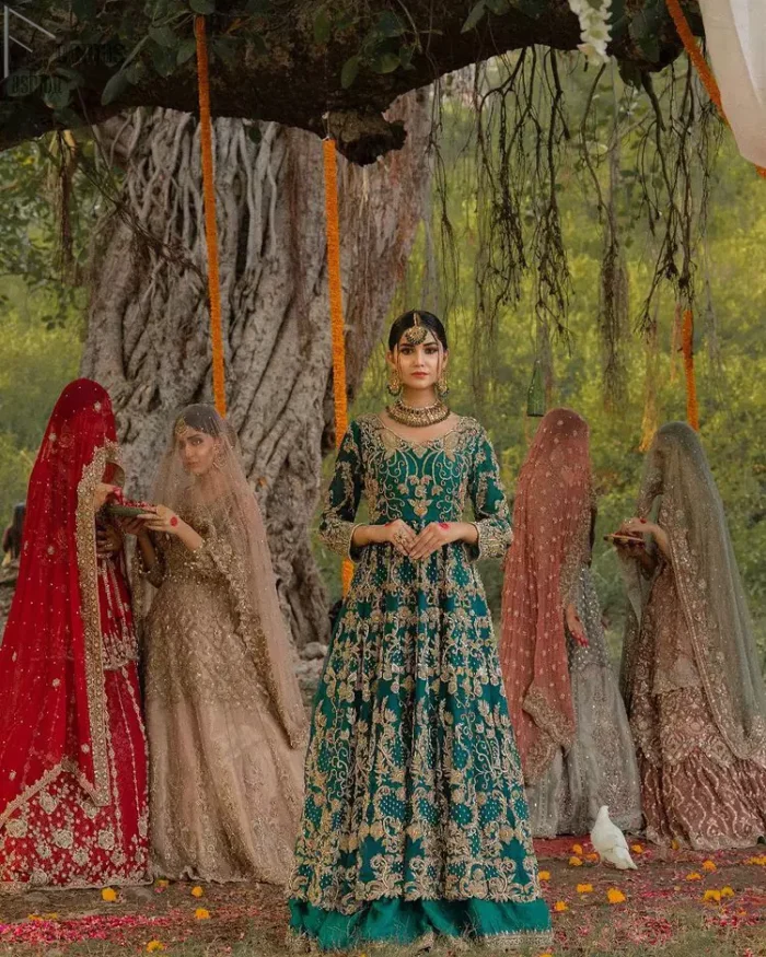The new season is all about making a statement. Unique craftsmanship and detailed embellishments bring heavenly hued gossamer fabrics to life. Add a charm to your mehndi with an intricately golden embellished bodice and motifs all around the flare on sea green canvas of organza. Daaman is elegantly decorated with embroidered golden floral bootis, sprinkled sequins and beautiful craftsmanship. Pair it up with sea-green sharara having delicate details at the bottom instantly draws attention. To complete the look, go with ivory brocade dupatta.