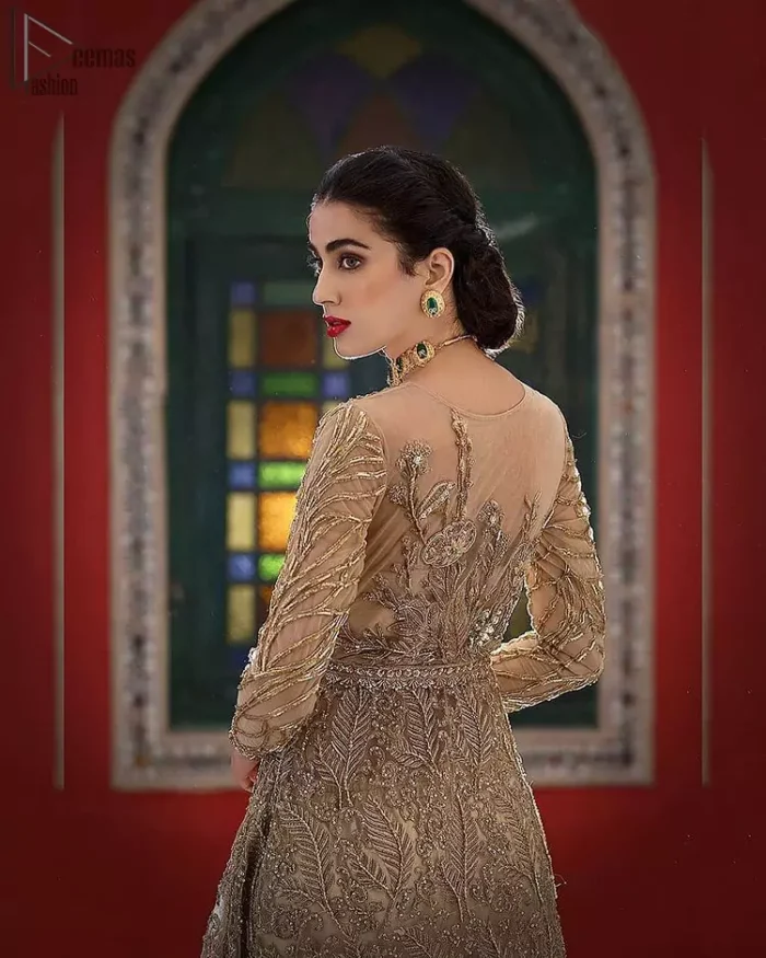 Elevate your style this season with our fashion-forward designs. An artistic vision of classic style and luxurious detailing, transpire into a truly romantic and iconic bridal for your big day. An eye captivating front open long silhouette is fully decorated with antique embellishments all over. Furthermore, it is emphasized with an embellished waist belt and scalloped borders. Pair it up with capri pants and a net dupatta scattered with sequins all over.