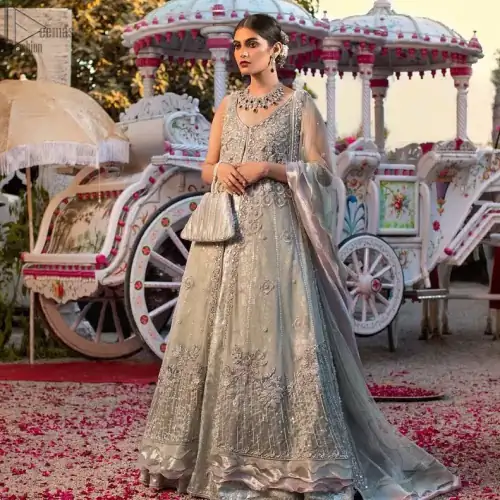 Light gray pure banarsi jamawar blouse, lehenga with front open long jacket having multiple layered frill.