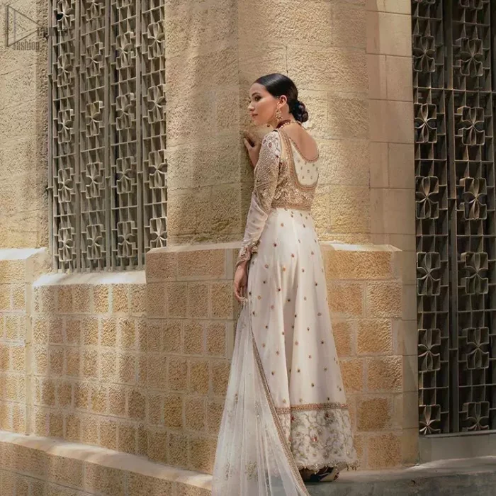 Exceptionally styled and symphonized stitching makes you gorgeous enough that it would surely make your big days remembering one. The Ivory Pishwas Frock is a true beauty when it comes to the work of perfection. Latest Nikah Dress - Ivory Pishwas Frock n Dupatta.