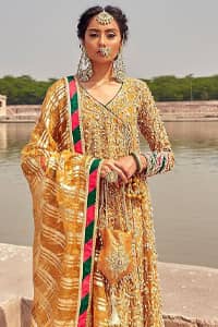 Latest Mehndi Wear - Mustard Angrakha Frock - Chatta Patti Dupatta. A perfect wedding dress is all about its design and glamour.