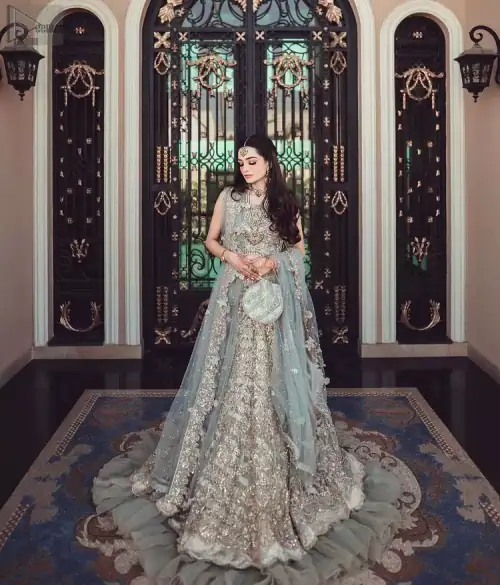Delicately crafted, personifying elegance with an element of grandiose, Nikah Wear - Pastel Blue Lehenga Blouse.