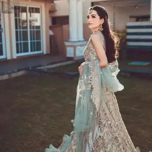 While the pearl and sequins work all over the pastel blue dupatta contributing the most to the charm. Nikah Wear