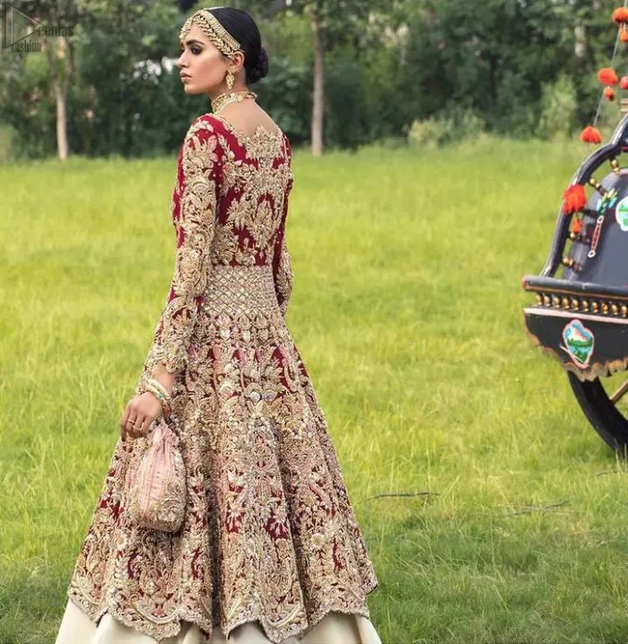 Best Nikah Dress - Red Front Open Gown Inner Ivory Lehenga Maxi. Glorify yourself by suiting up with the exceptional dress ranges from the house of DeemasFashion out of which one is here to make you graceful enough to make all jaws drop down. Red Organza with sweetheart necklined fully engraved, chantilly appliqued and giving a kind of look that you will surely love to have. Along with the elegant ivory coloured floral motifs having maxi lehenga in your drop-down menu of this gorgeous outfit. The fully embossed tea rose organza dupatta is giving major traditional vibes with scalloped borders that will surely suit your face beauty.