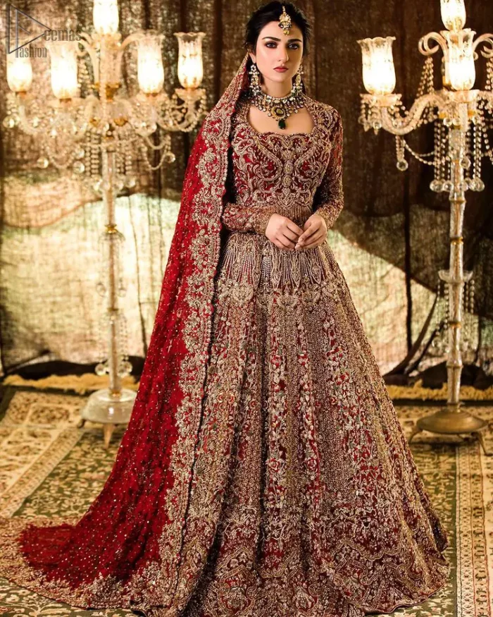 A truly exquisite ensemble that is sure to make heads turn on your big day. With a lot of attention to detail, the intricate sequencing using glass beading and threads makes the blouse look like nothing but a dream. Coordinated with a floor kissing asymmetrical lehenga adds to its charm. Intricate details, Refined craftsmanship is at its best with hand embellished zardozi work all over. Complete the look with a fully embellished dupatta adds the right amount of drama to this bridal outfit finished with scalloped borders and scattered sequins all over the ground.