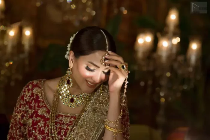 Looking perfectly gorgeous is not a mere utopia. You already appear stunning but with the Crimson Lehenga Blouse on you, things will definitely get unimaginably beautiful. A marvellous combination of a three-quarter sleeved Crimson blouse choli, an elegant lehenga and a tan net dupatta, dazzle up the dress with unexplainable enchantment. The attire features a heavy centre panel and a mesmerizing round neckline, designed with skill and accuracy. To add more to its exquisiteness, a fascinating work of golden embroidery follows an outstanding adornment of floral motifs. Graceful as it is, pure organza blooms its meritoriousness, making the dress a whole treat to your reception day.