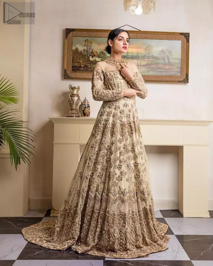 Shine like a diamond with the Ivory Back Train Maxi, a charming full-sleeved bridal wear with a unique majestic illusion neck, making you the distinctive queen of the night. Decorated with floral motifs in a can-can style, a master artwork of multicolour embroidery enhances the magnificence of the attire. The dress code includes a stunning maxi made of elegant organza, a fabulous churidar pyjama made with raw silk to feel comfortable and charming as well, and an organza dupatta. The imperial appearance of this ravishing bridal wear is worth a fortune. With complete style, this attire would serve you with great honour on your walima or nikkah day.