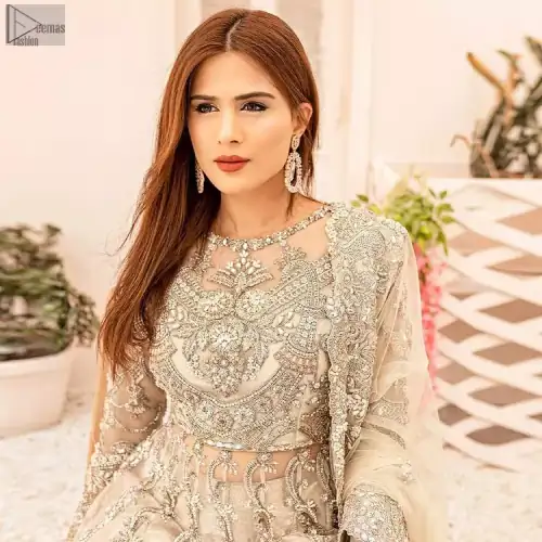 Designed with intricate precision, the Ivory Lehenga Pishwas speak sheer professionalism and utmost beauty.