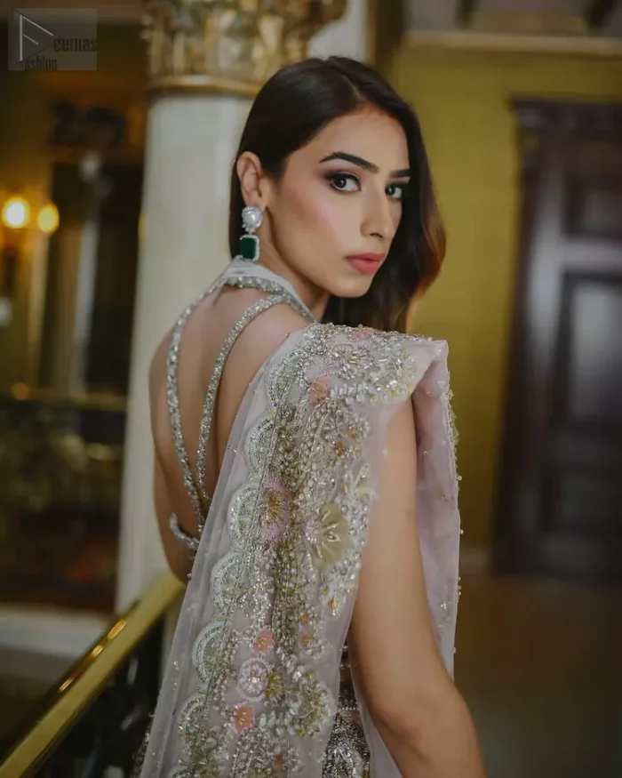 This ravishing attire follows a stunning blouse, a graceful lehenga and a touch of perfection with a dupatta, all made dexterously with the finest organza.