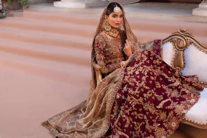 Its laudable can-can style and floral motifs work as the base for the extremely meritorious work of multi-colour embroidery and mirror work under its distinctive boat-shaped neckline.