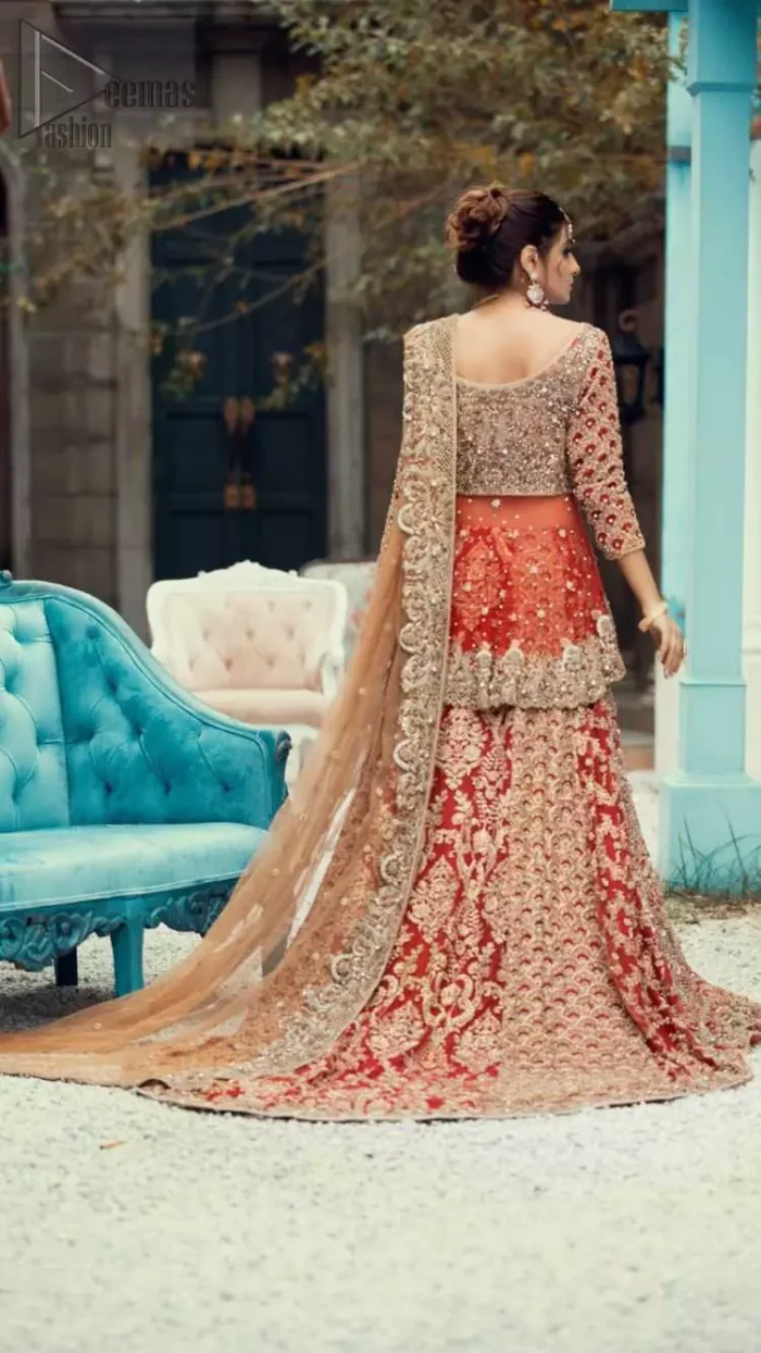 Red Peplum and Lehenga with Rust Net Dupatta. It features a highly remarkable back train and is decorated with fascinating criss-cross patterns. charming as it is, the very exquisite dress code includes a mesmerizing organza peplum, a gorgeous organza lehenga and not to forget, the traditional touch with a net dupatta. 