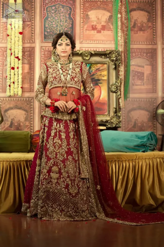 A little blend of the traditional and western styles doubles the gorgeousness of the Red Short Shirt Lehenga. A dress with such dexterity that it holds the magic towards a gorgeous wedding day. Its can-can style and cultural styled full-sleeves are indeed a contribution to the overall exceptional beauty of the dress. Purest organza as the most graceful as well as the comfortable fabric is chosen by our professional designers for this highly ravishing attire. As per the dress's need, a boat-shaped neckline appears admirable, while the exceptional work of golden embroidery assures you of the lots of attraction you'll receive on your Reception day.