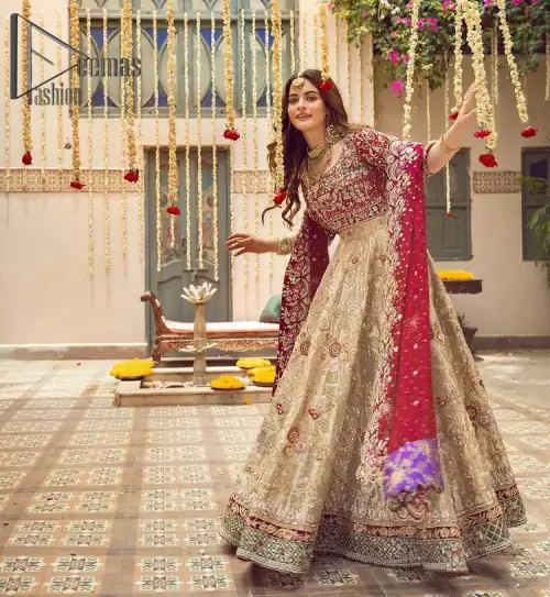 It's distinctive how the new-gen brides are welcoming red and beige shades for their bridal outfits as well. So Welcome