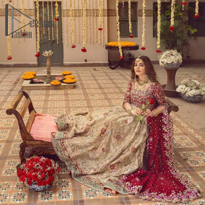 It's distinctive how the new-gen brides are welcoming red and beige shades for their bridal outfits as well. So Welcome your guest to this charming beige lehenga. The three quarter-sleeved Red Blouse  got it all for you. In addition to this, the Beige lehenga have embellished border embroidery and floral embroidery in dabka, kora work that give the stunning look. Furthermore, it is enhanced with embroidered applique bottom. The organza red dupatta that has a scalloped applique border all around the edges makes the look complete and comprehensive.