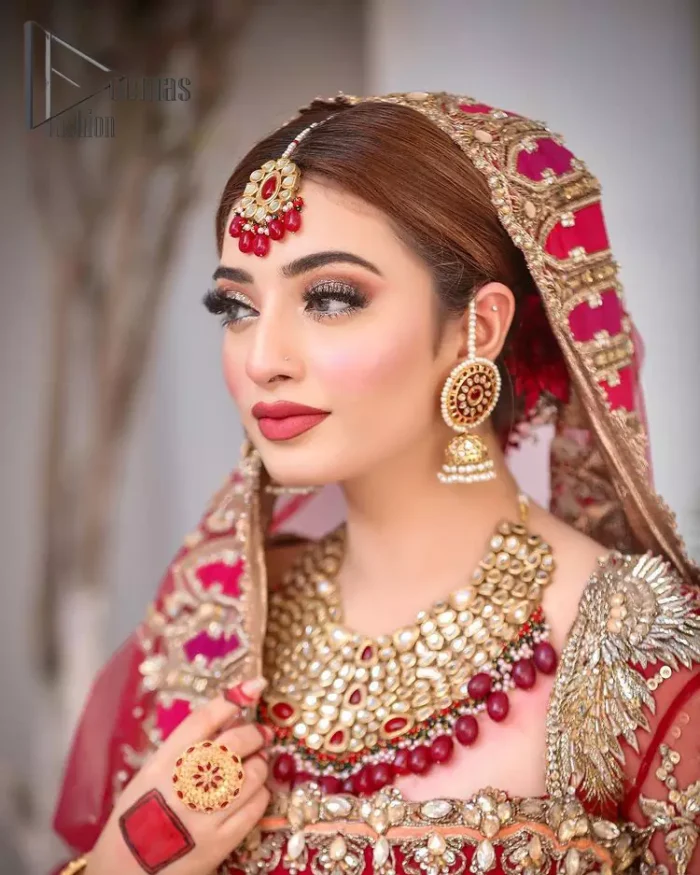 Red, is the colour of love being objective for your Big day. As every bride wants to feel as fresh as she is on her Big day so this frilled maxi is the final choice for her that is priceless. This red front open maxi is embellished with kora, dabka and tilla embroidery and its ruffled bottom gives even more enhancement to the article. This maxi is coordinated with an organza dupatta that is embellished with four-sided heavy lace that gives you the optimum feeling on your big day.