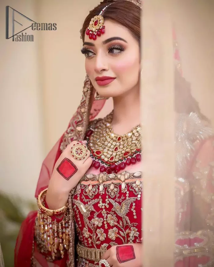 Red, is the colour of love being objective for your Big day. As every bride wants to feel as fresh as she is on her Big day so this frilled maxi is the final choice for her that is priceless. This red front open maxi is embellished with kora, dabka and tilla embroidery and its ruffled bottom gives even more enhancement to the article. This maxi is coordinated with an organza dupatta that is embellished with four-sided heavy lace that gives you the optimum feeling on your big day.