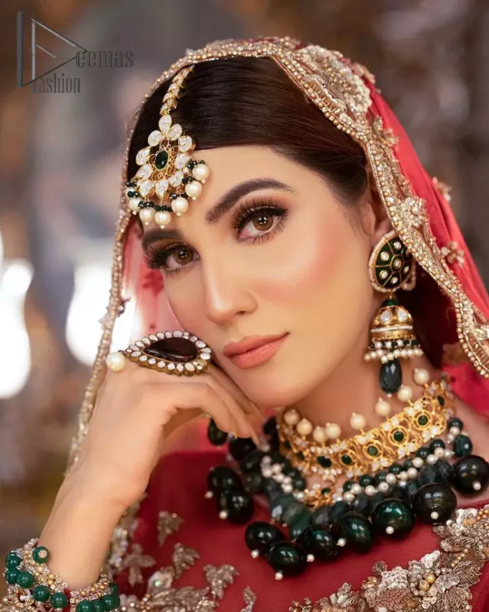 Take your style up a few notches with this bold yet elegant piece on your Big day. This red full sleeves habitual blouse choli is remarkably made with pure organza, styled easily and graciously with boat shape neckline and fully embellished with tilla, kora , dabka work. In addition to this, the frilled lehenga is also fully embellished with heavy embroidery that perfectly enhance your dazzling style on your Big day. Finish this look with a red dupatta that have sequins spray all around and embellished with four sided border as well.